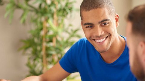 Two people sat talking