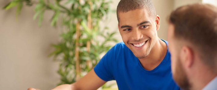 Two people sat talking