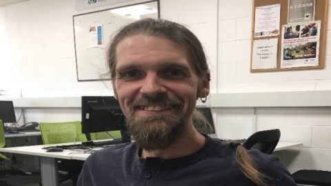 Man with beard smiling